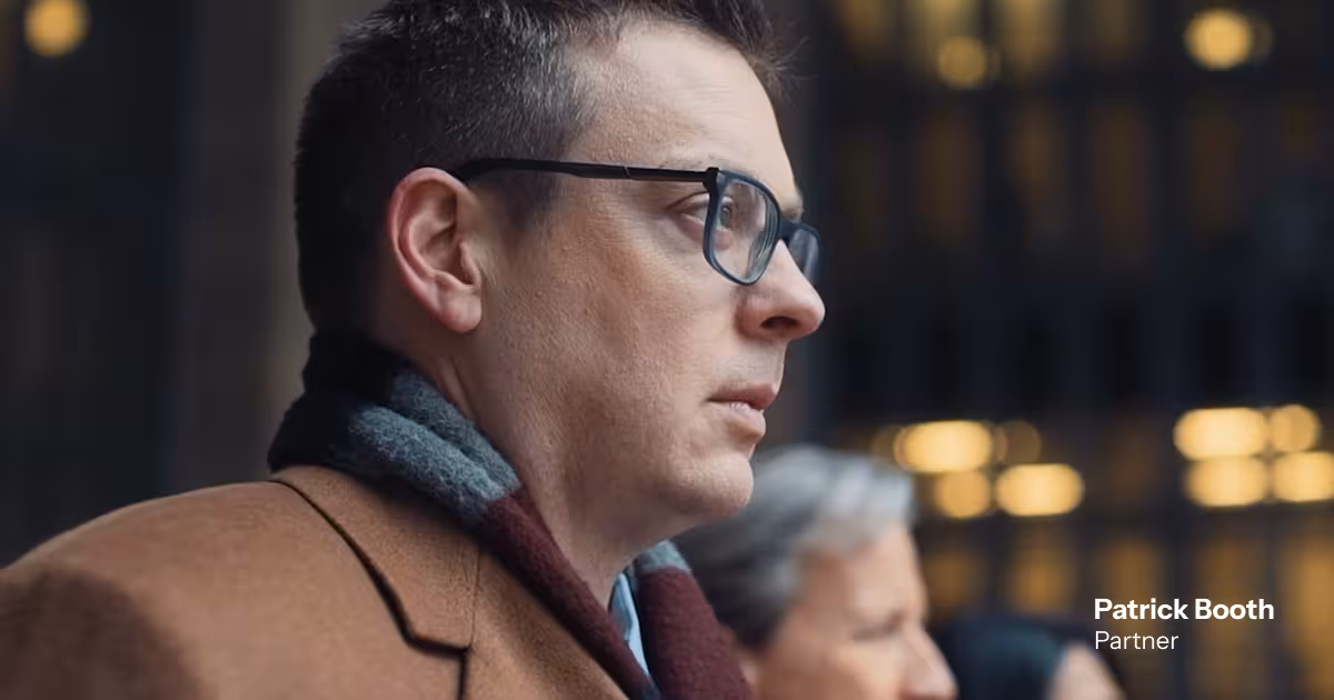Patrick Booth, Partner at Chaffin Luhana LLP, standing outside a courthouse, representing leadership and dedication to justice.